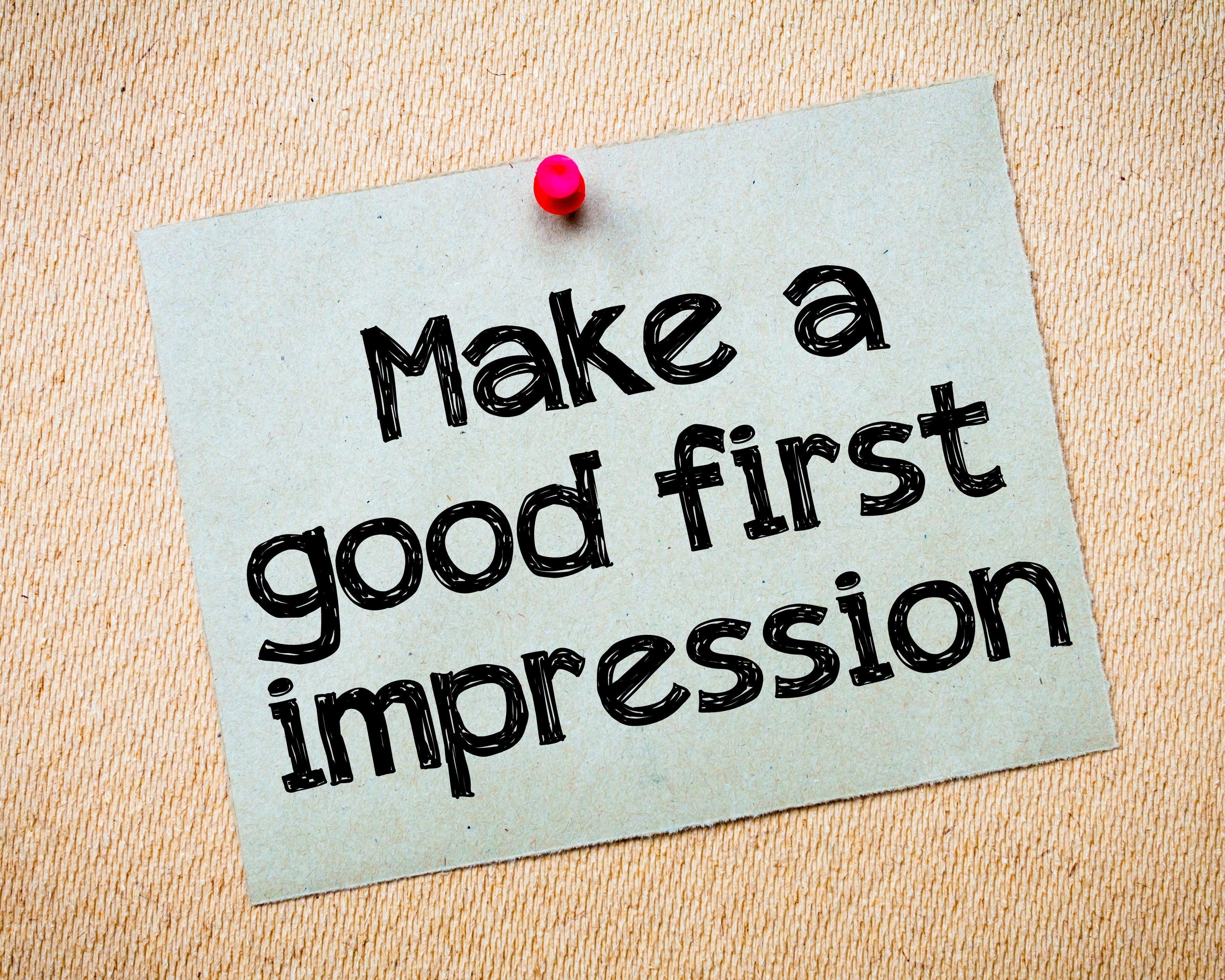 make a good first impression sticky note on bulletin board