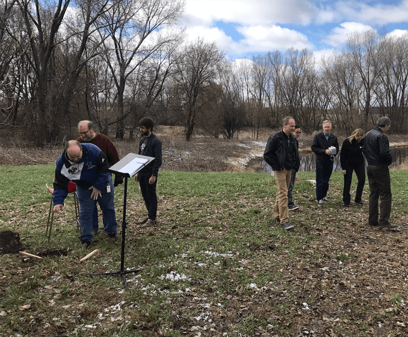 group of people outside in nature around Fall time