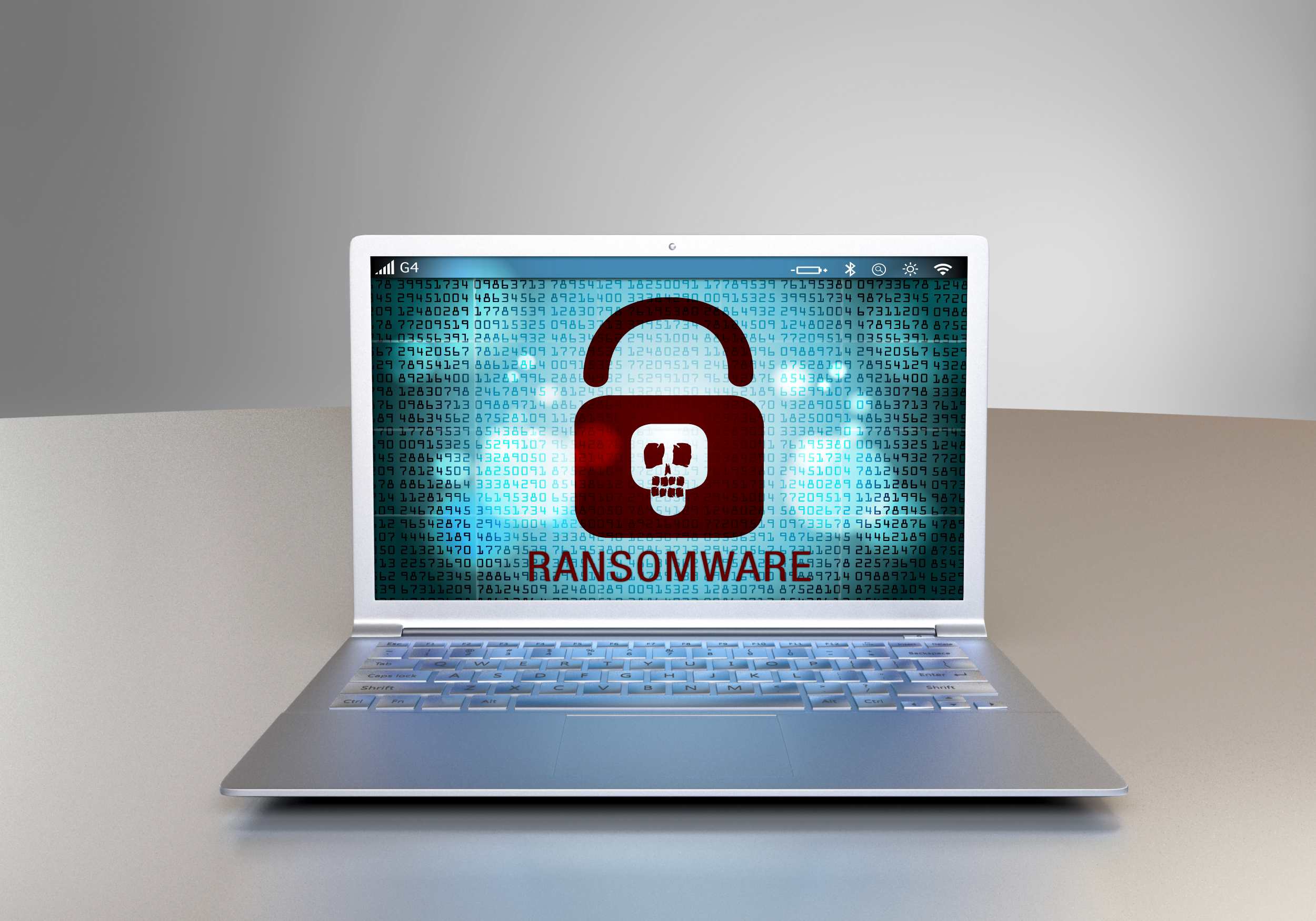 laptop with ransomware screen alert