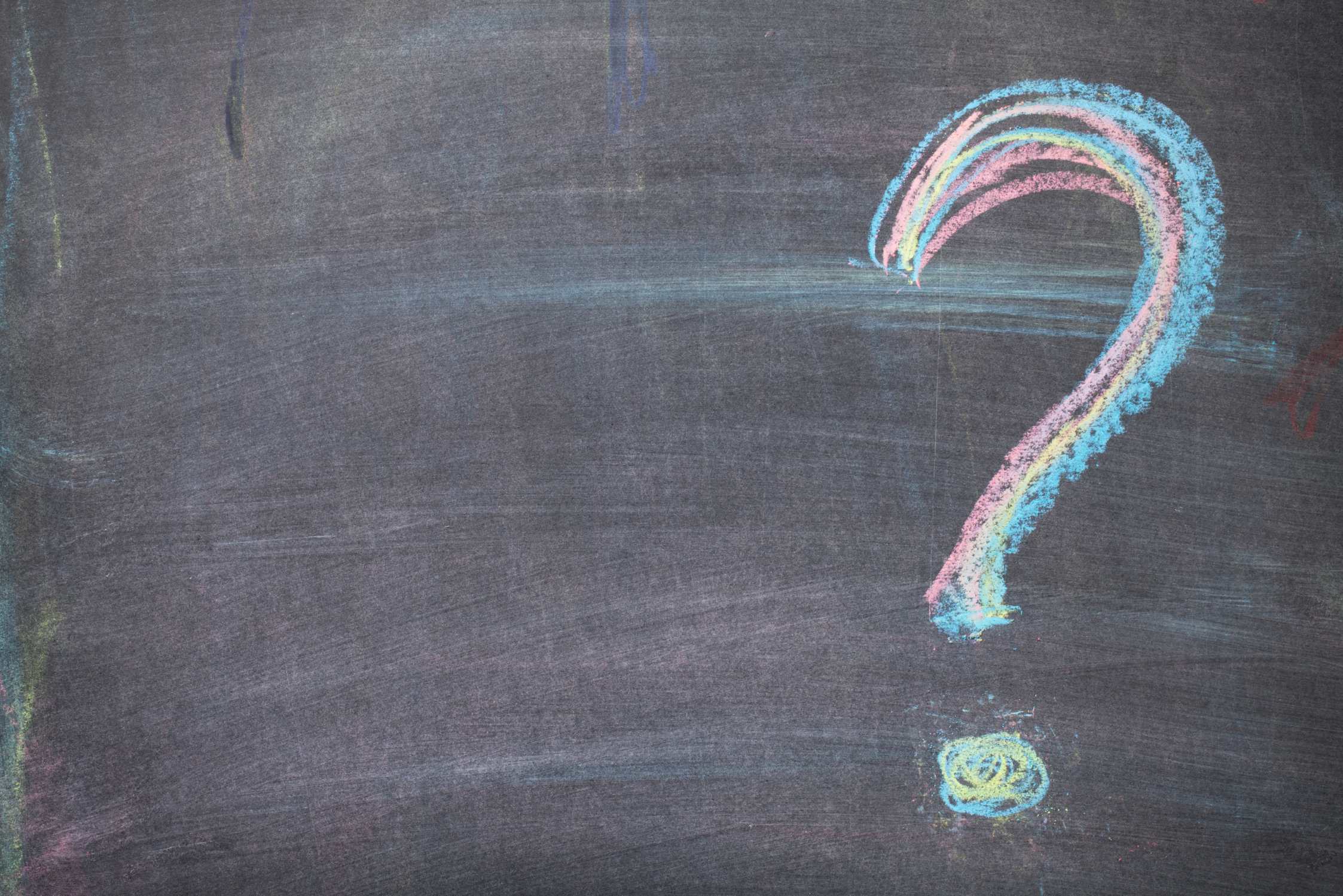 colorful question mark on chalkboard