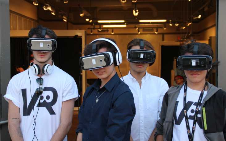 4 guys w virtual reality headset gear