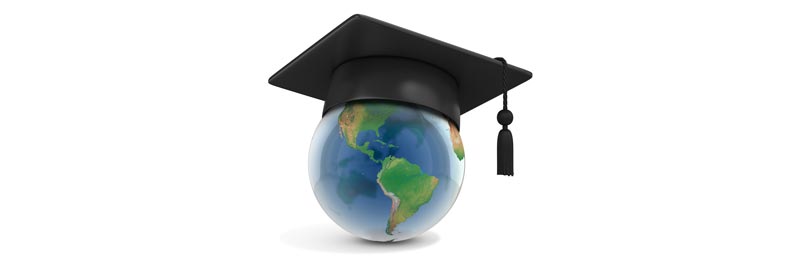 graduation cap on world globe