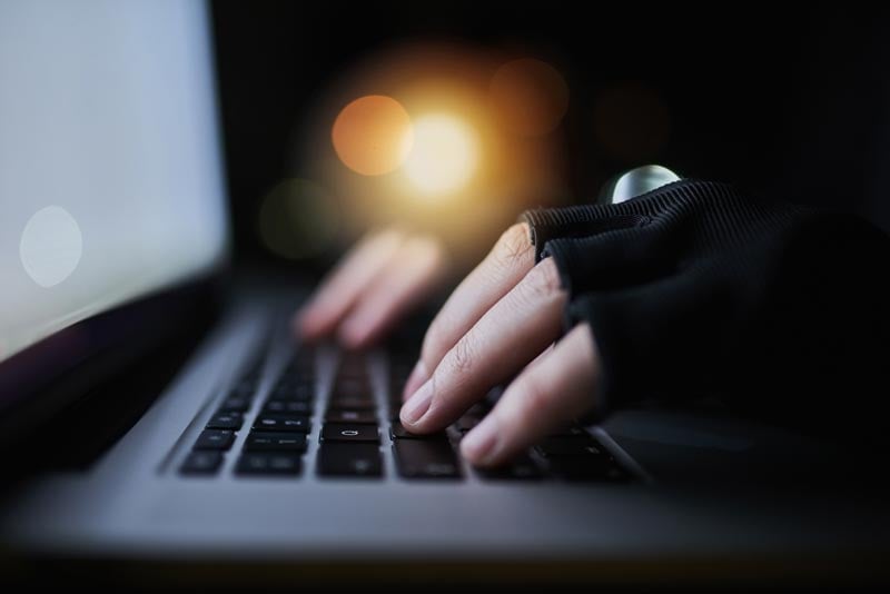 hacker hands on keyboard