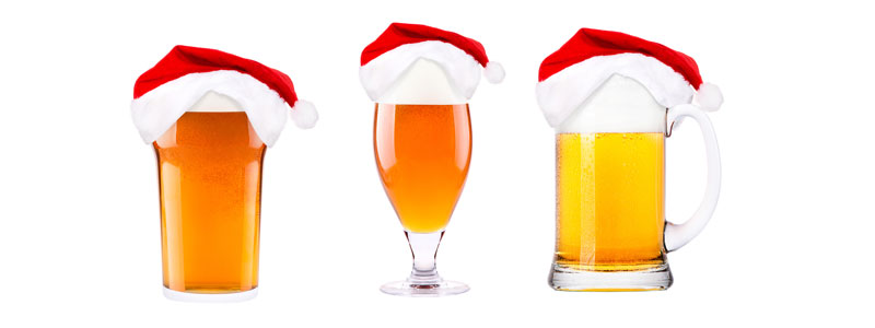 3 beers w santa claus hats on them 