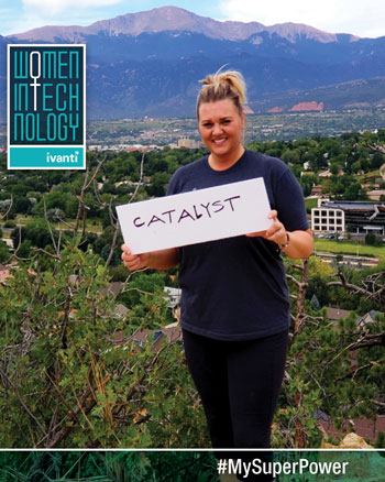 women in technology - woman holding catalyst sign