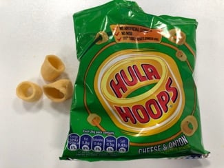a bag of hula hoops corn snacks