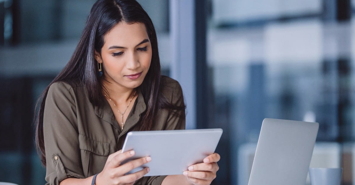 Woman looking at a tablet device