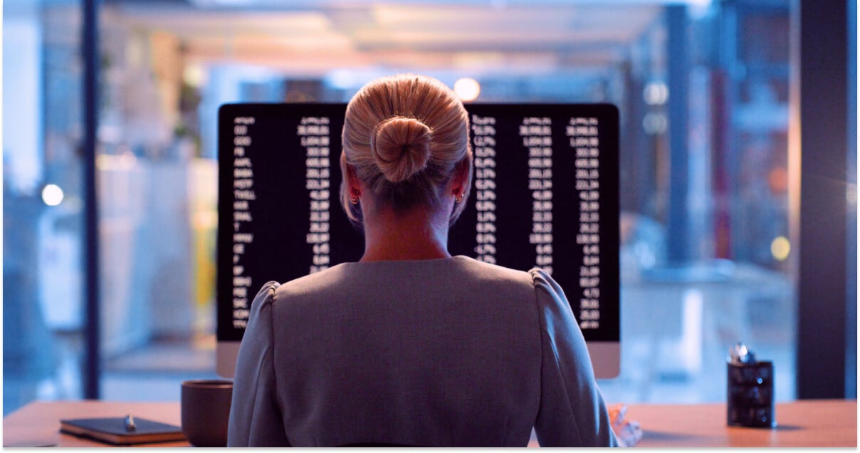 Woman interacting with a desktop computer