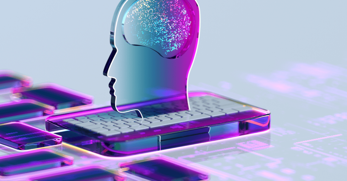 a stylized transparent head and brain on top of a keyboard