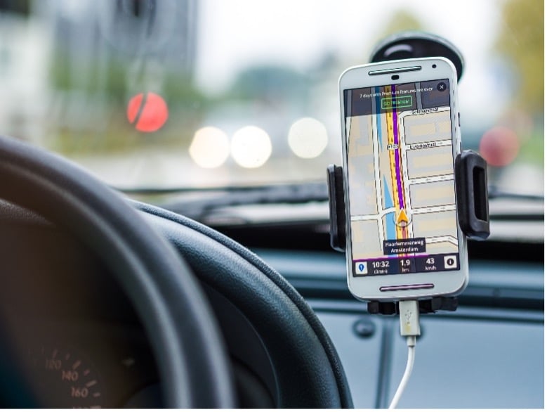 smartphone with gps mounted in a car