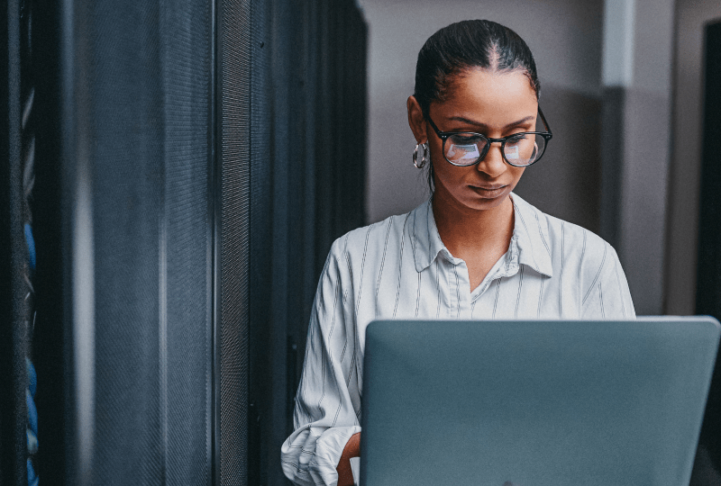 woman interacting with a laptop