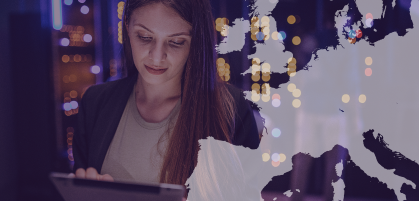 A woman using a tablet in a modern setting with city lights in the background. A transparent map of Europe overlays the right side of the image.