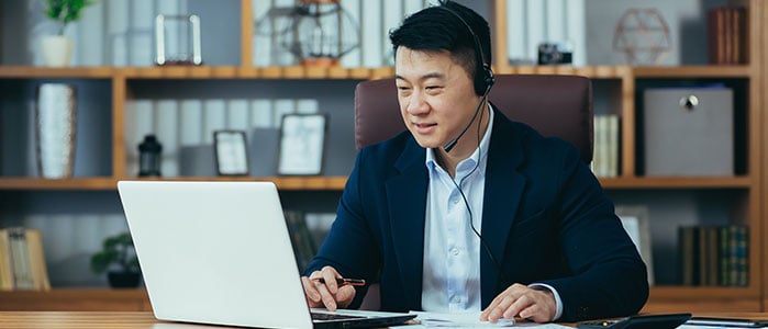 man working at a laptop