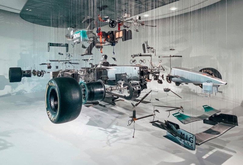 imag of a racing car hanging from the ceiling