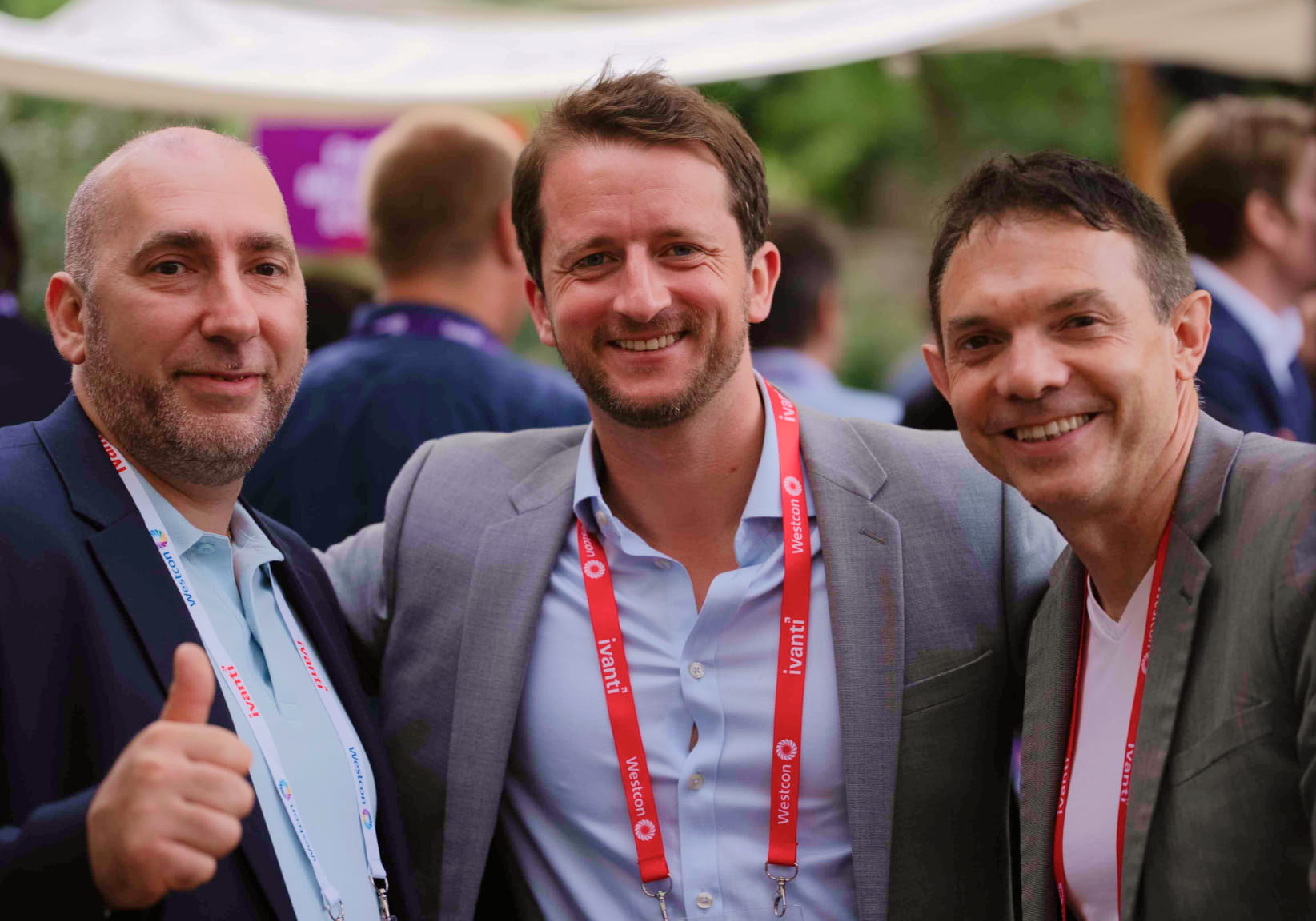 three attendants posing for a photo