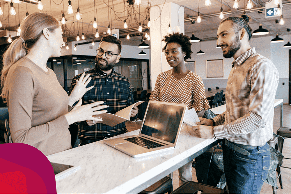 people discussing business at a counter