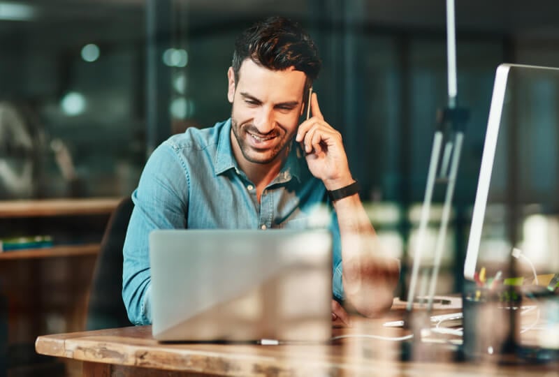 man looking at a computer