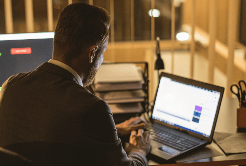 Man working on a laptop.
