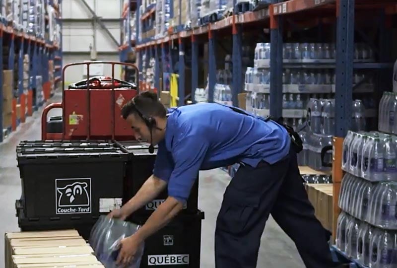 guy stacking water