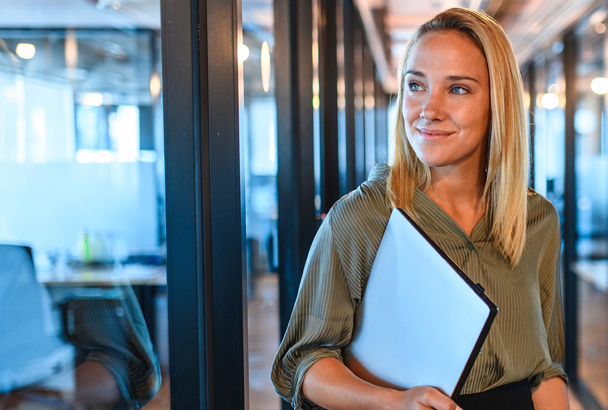 woman holding a laptop