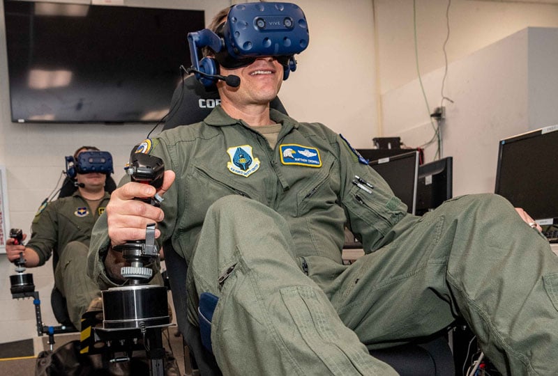 2 army officials using virtual reality headset gear
