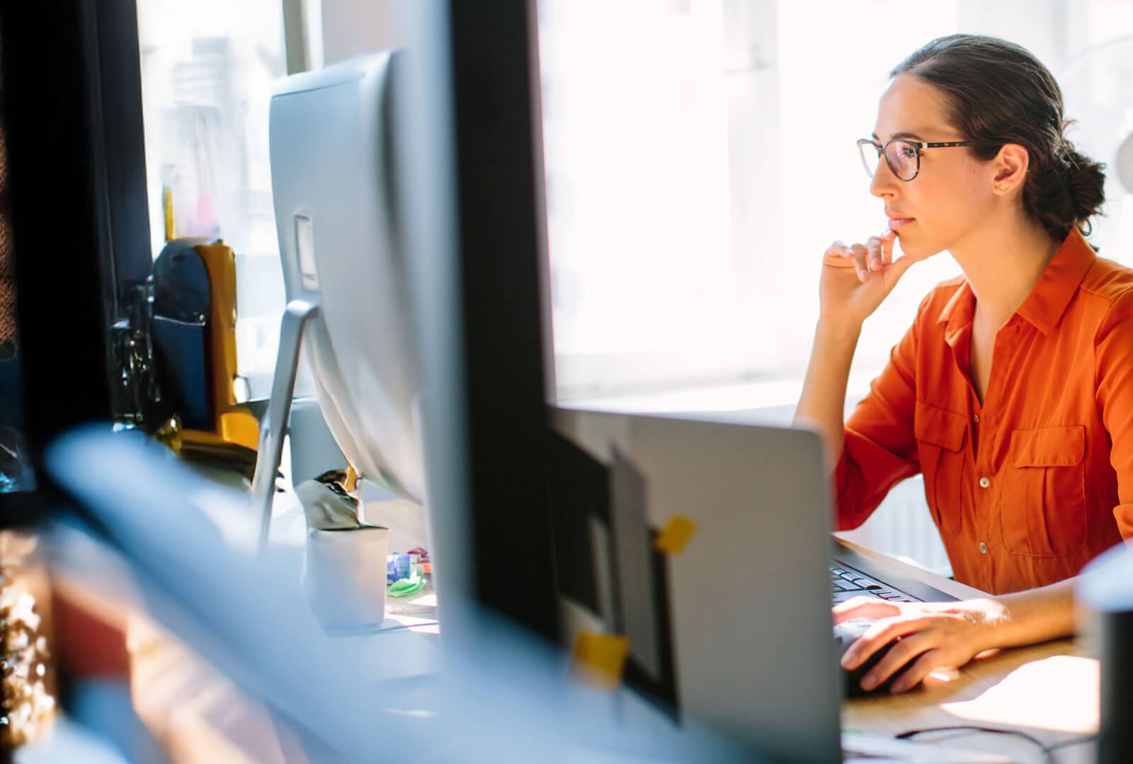 woman looking at a monitor