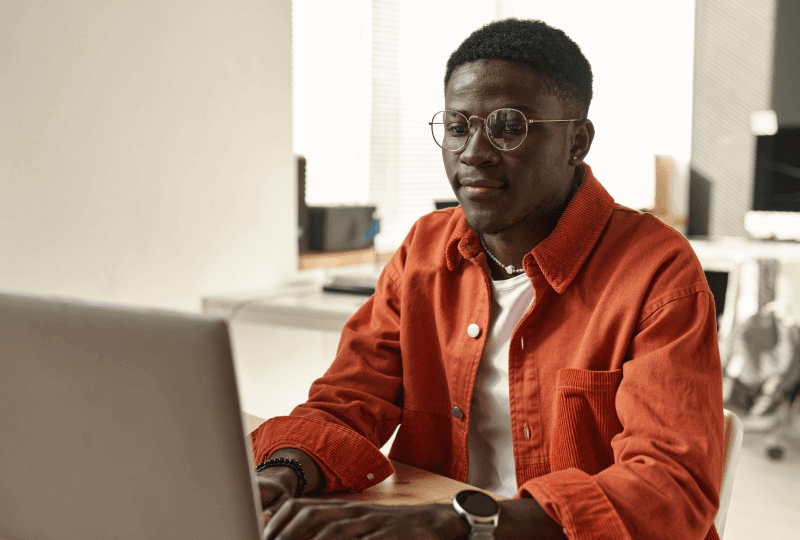 a man working at a laptop