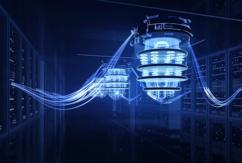 Quantum computer technology in server room with glowing data wires.